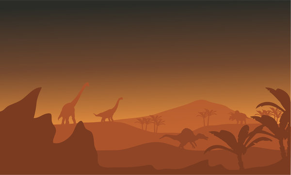 Silhouette of dinosaur in fields