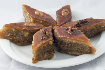 Oriental sweets on a white background praise Baku with walnuts
