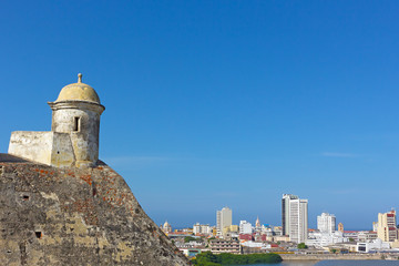 San Filipe de Barajas Castle tower and a view on Cartagena old city, Colombia. City panorama with Cartagena city landmarks in the morning.