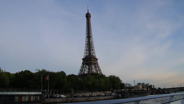 FRANCE, PARIS - JUNE 8, 2015: Part of famous Eiffel Tower from boat on river