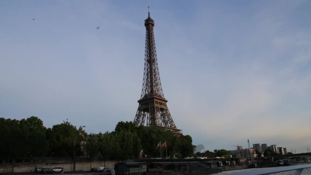 FRANCE, PARIS - JUNE 8, 2015: Part of famous Eiffel Tower from the boat on river