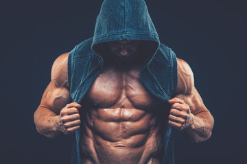 Man with muscular torso. Strong Athletic Men Fitness Model Torso - obrazy, fototapety, plakaty