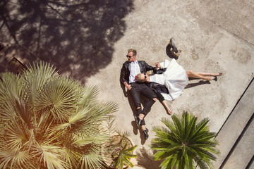 Outdoor fashion portrait of young beautiful couple. Valentine's Day. Love. Wedding
