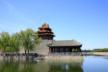 Fototapeta na wymiar The Forbidden City turrets，under the blue sky white clouds