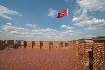 Historical flag of Lithuania over Medininkai castle