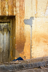 unkempt wall and door