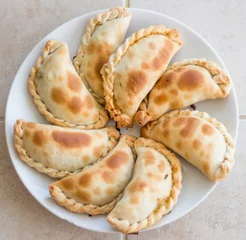 Fototapeten top view plate of empanadas © jamiebergandi