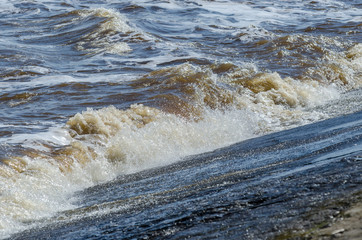 waves breaking on the shore