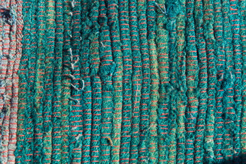 texture of woven cotton green and blue thread