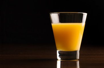 A glass of chilled orange juice