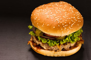 hamburger on black stone plate