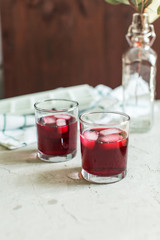 two glasses of fruit drink blackcurrant