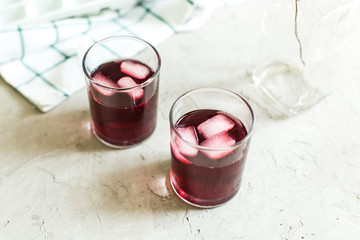 two glasses of fruit drink blackcurrant