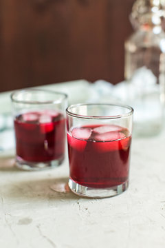 two glasses of fruit drink blackcurrant