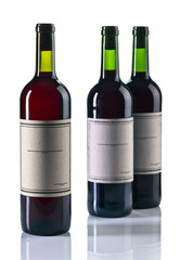  bottles of red wine isolated on white