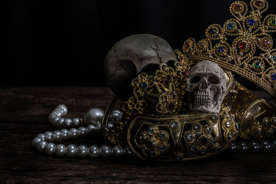 Still life Skull with Treasure Gold jewelry, pirate concept.