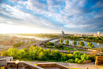 Bratislava cityscape view on the southern part of the city with modern bridge and Danube river from the castle hill on the morning in Slovakia