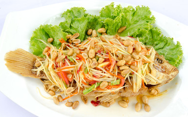 Deep fried red tilapia with papaya salad.