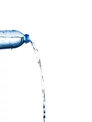 Fotobehang Pouring water from bottle © Johnstocker