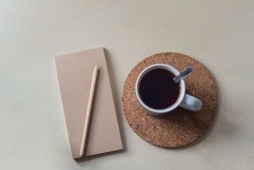 black tea on a cork stand