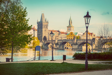 Naklejka premium Prague, Czech Republic skyline with historic Charles Bridge and Vltava river. Vintage
