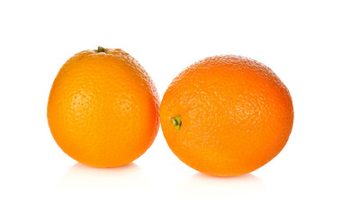 whole ripe orange on white background