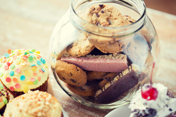 close up of cupcakes, cookies and muesli bars