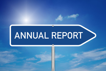 Annual Report auf Schild mit blauem Hintergrund