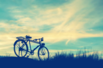 Fototapeta na wymiar beautiful silhouette of bicycle soft tone