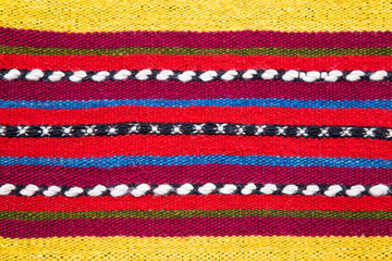 Bulgarian hand woven woollen rug in a bright striped pattern