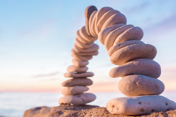 Arch of white pebbles