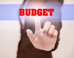 business woman touch BUDGET Text