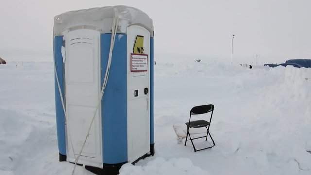 Toilet at the North Pole in Arctic. ICE CAMP BARNEO, ARCTIC - APRIL, 2010:  Drift station on frozen Ocean near North Pole. With its integrated ice runway, caters for air borne tourist industry.