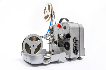 Vintage motion picture film projector and reel of motion picture