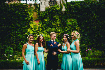Handsome groom and pretty bridesmaids