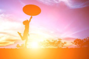 Little girl holding an umbrella, Happy jumping on a beautiful da