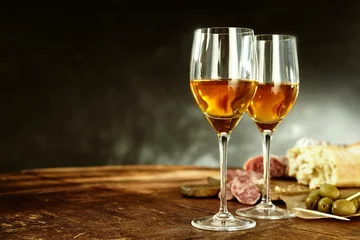 Fotobehang Two glasses of sherry with tasty tapas © exclusive-design