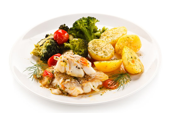 Fish dish - roasted fish fillets and vegetables 