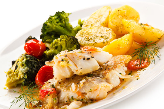 Fish dish - roasted fish fillets and vegetables 