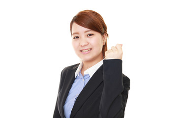 ガッツポーズのビジネスウーマン