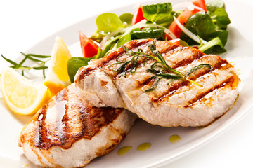 Grilled steaks and vegetables