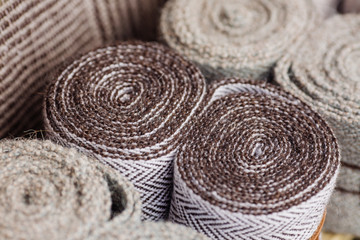 Fototapeta na wymiar hand made of wool fabric rolls.