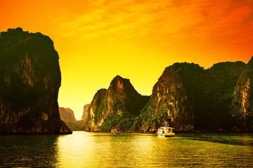 HALONG bay in sunset in vietnam. UNESCO World Heritage Site. This view from TiTop island and its most popular view for travel in Halong bay.
