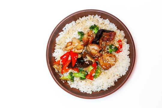 traditional Chinese dishes, rice with chicken and vegetables on