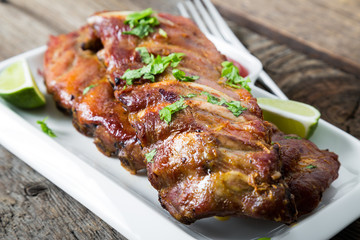 Grilled pork ribs with herbs