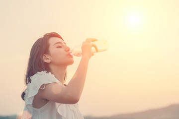 Woman drink water for thirst