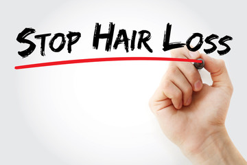 Hand writing Stop Hair Loss with marker, health concept background