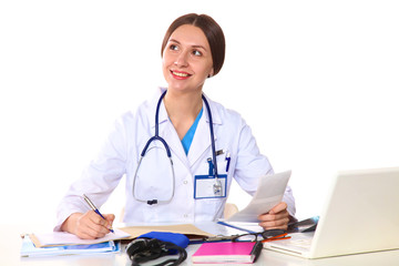 Happy smiling young beautiful female doctor showing blank area for sign or copyspace, isolated over white background