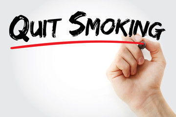 Hand writing Quit Smoking with marker, health concept background