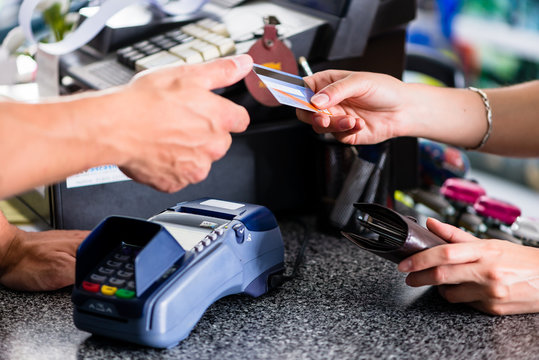 Credit Card Payment At Terminal In Shop